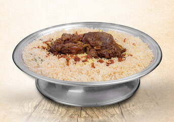 Mandy Hashi with nuts served in dish top view of middle east food