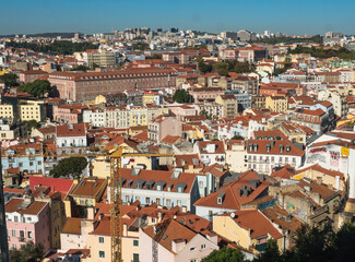 Fototapeta na wymiar Aerial panoramic view of Lisbon skyline in Portugal seen from the viewpoint called Miradouro da Graca at Alfama district