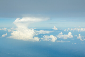 Fototapeta premium Blue Sky and Storm from Airplane Window View