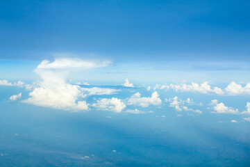 Blue Sky and Storm from Airplane Window View