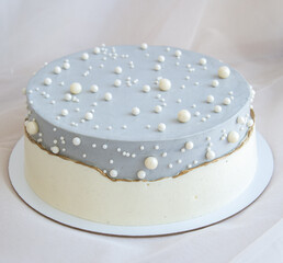 blue cake with a ribbon