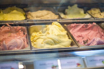 a close up shot of a street food in a shop with ice cream