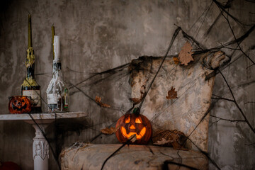 Background of decorations for Halloween celebration. A scary composition with Jack's pumpkin and...