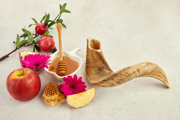 Rosh hashanah, jewish New Year holiday concept. Pomegranate, apples and honey traditional products for celebration
