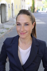 Businesswoman wearing elegant suit headshot 