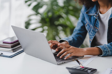 office girl's hands typing input data