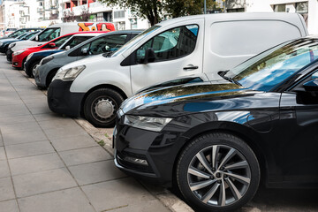 Fototapeta premium Cars are parked along the road.