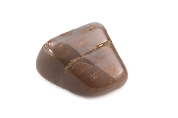 A piece of polished brown moonstone mineral with light veins