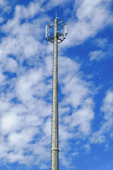 Obraz premium Telecomunication tower at the sky. Cell phone connectivity 5G, mobile base station