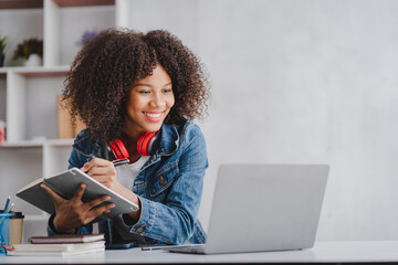 african american female students studying online using laptop online meeting