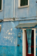 Blue wall of the house, Burano, Italy 
