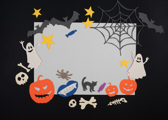Halloween card. Sheet of paper decorated with halloween characters. Copy space.