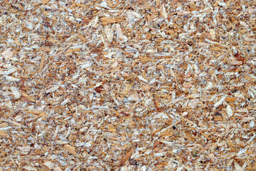 Close up pressed wooden panel background, the texture of oriented strand board - OSB wood.