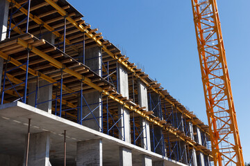 Construction of a residential building. Part of urban real estate and architecture. Facade of a residential building.