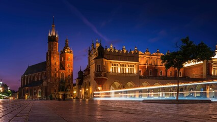 Obraz premium Kościół Mariacki i Sukiennice w Krakowie o poranku - średni format GFX 50 sII 