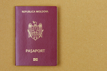 Modern foreign passport of a citizen of the Republic of Moldova. Background with copy space on the right