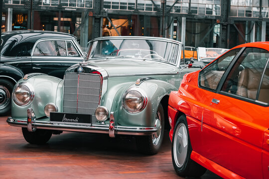 21 July 2022, Dusseldorf, Germany: Mercedes-Benz vintage car and other exhibits in the museum of retro and modern cars with the possibility of buying