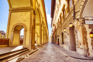 Ponte Vecchio Bridge during Beautiful Sunny Day with Reflection in Arno River, Florence - obrazy, fototapety, plakaty