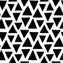 Seamless pattern with charcoal triangles. Hand drawn charcoal or chalk drawing with rough edges and dry texture. Vector black geometric background with various triangle shapes. Sketch design for print