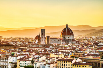 Fototapeta na wymiar Florence Aerial View at Golden Sunset over Cathedral of Santa Maria del Fiore with Duomo