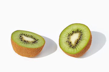 Half of kiwi fruit on white background