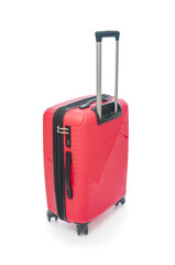 Red plastic travel bag close up on white background