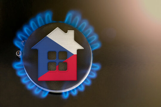 gas crisis. Rising utility costs in Czech Republic. Energy crisis, export-import problems in Czechia. The concept, gas burner and house model are colored in the colors of the flag.