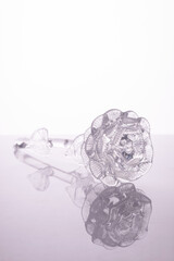 souvenir glass crystal rose on a white background