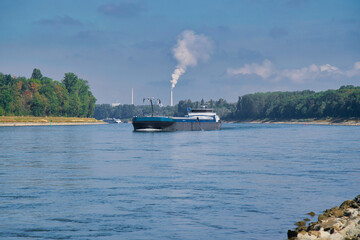 RHEIN, GERMANY - September 2022: A beautiful shot of the cargo ship on the Rhine river near...