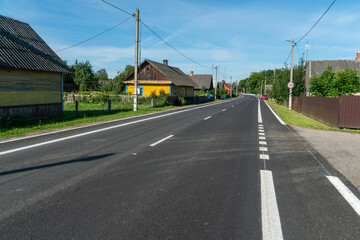 New modern asphalt in rural areas. High-quality conditions for business development in the field of cargo transportation and logistics.