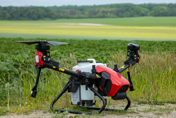 A modern solution in agricultural. Use of robotic systems with agriculture spraying drone fly to sprayed spraying chemical from insects - insecticides, fungicides, acaricide, or herbicides from weeds.