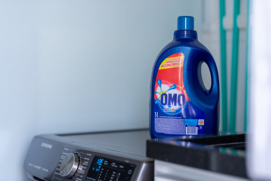 Omo, Unilever brand laundry soup on the top of a washing machine. Brazilian portuguese writen. Product from Brazil