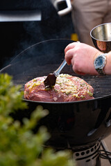 chef preparing food on the barbecue 