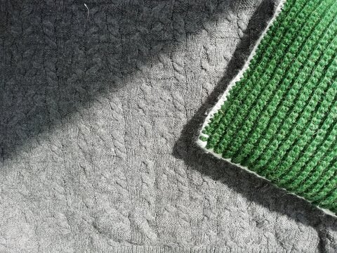 green and grey knitted texture background