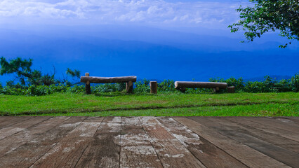 Obraz premium Wooden floor with nature mountains landscape background