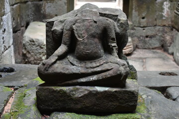 Fototapeta na wymiar Headless Seated Buddha in Preah Khan Temple, Siem Reap, Cambodia