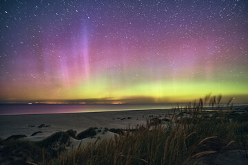 Northern Lights Aurora Borealis over danish Coast. High quality photo