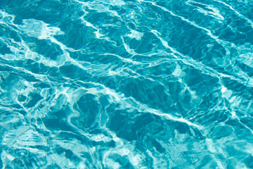 Fototapeta premium Water in swimming pool, background with high resolution. Wave abstract or rippled water texture.
