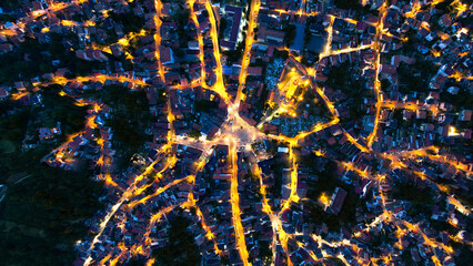 Aerial drone view of the Saint Nicholas Church in Brasov at night, Romania