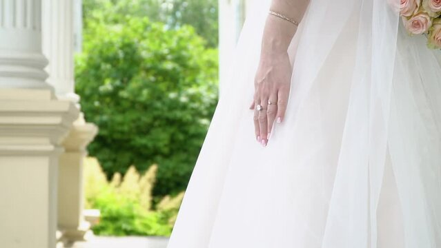 Beautiful vintage style wedding bouquet in the hand of teh bride