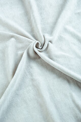 Solid color plush fabric of delicate color on a light background