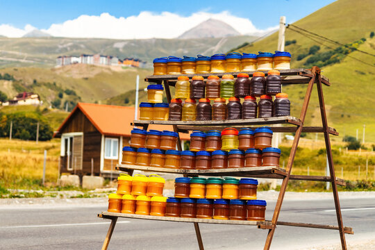 Jars of honey on a stall along Georgian Military Road in the Greater Caucasus mountains.