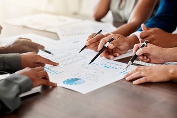 Teamwork, collaboration and team hands writing and working on financial data, chart and graph. Finance, ecommerce and tax audit workers project planning on logistics notes and an accounting analytics