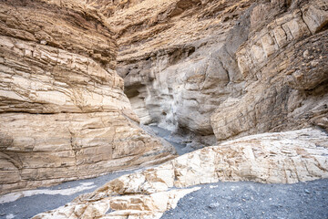 Trail Winding Through The White Walls Of Mosaic Canyon