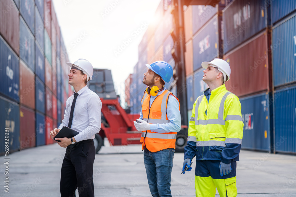 Poster Engineer container cargo with worker working and checking stock into container for loading,logistic and business export.