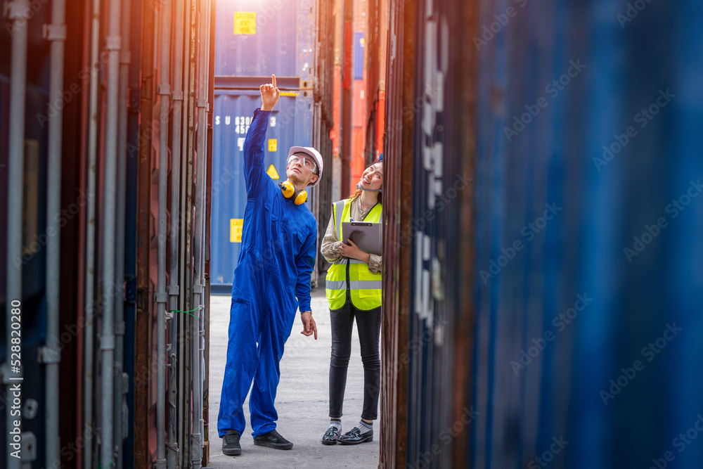Poster Professional container yard workers checking stock for loading in the container yard warehouse,Cargo Shipping Import and Export industry.