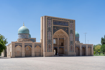 Landscape view of the facade and blue domes of Barakhan or Barak Khan madrasa on Khast Imam square, the religious center of Tashkent, Uzbekistan