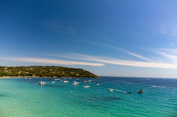 Fototapeta premium Aerial view of legendary Pampelonne beach near Saint-Tropez, summer vacation on white sandy beaches of French Riviera, France
