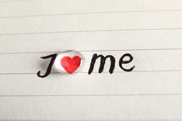 Phrase I Love Me written on paper, closeup view