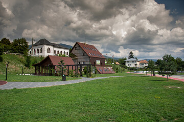 Fototapeta na wymiar Park and City Hall, Prundu Bargaului, Romania, 2022